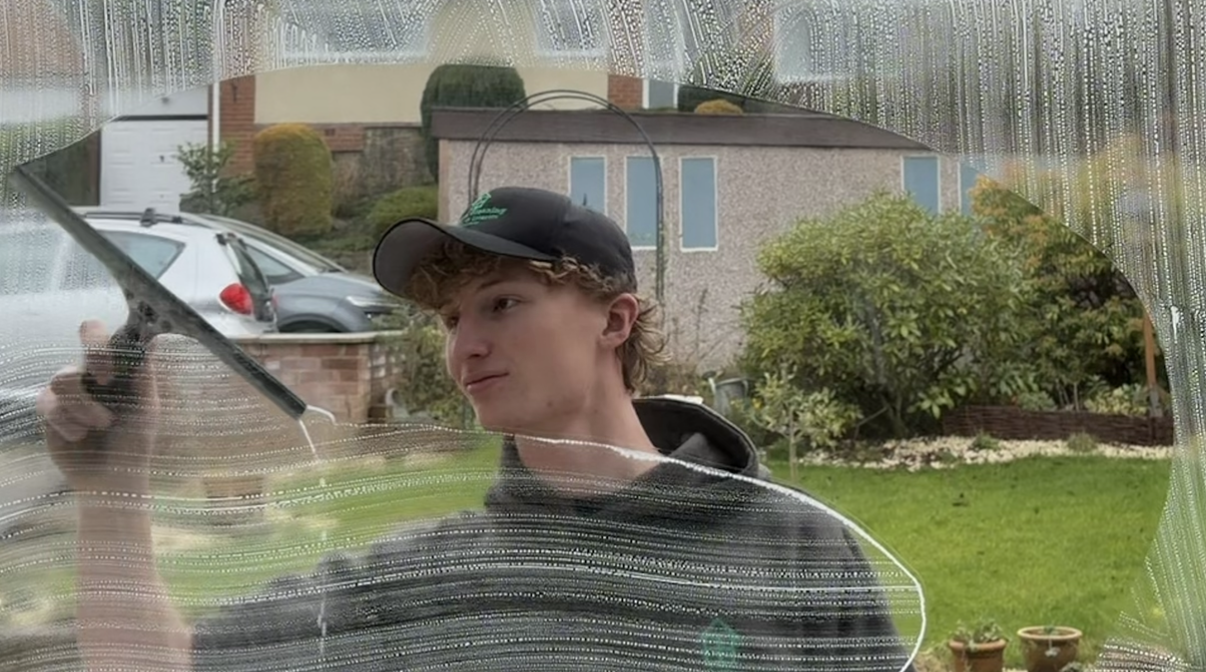 huggy cleaning window